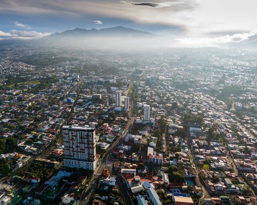 Urban traffic in San Jose, Costa Rica during sunset