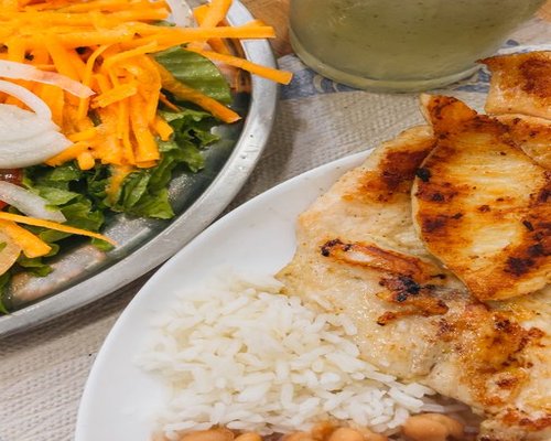 A healthy Costa Rican casado meal with rice, beans, and salad